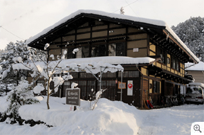 image:Snow covered Sakura guest house on January.